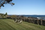 Front lawn with adirondack chairs and incredible ocean views.